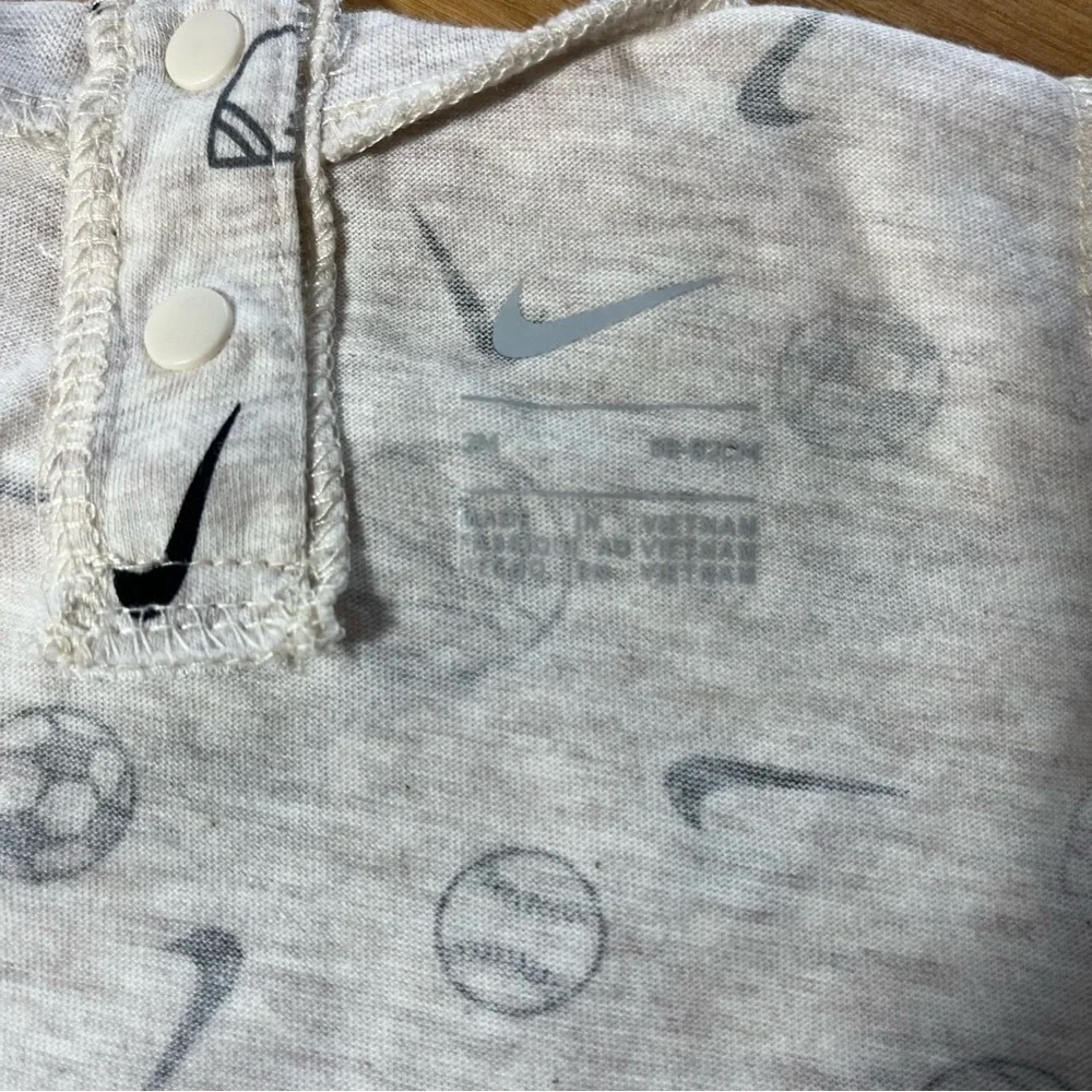 Nike Cream and Black Bodysuit with Short Sleeves and Sports Print